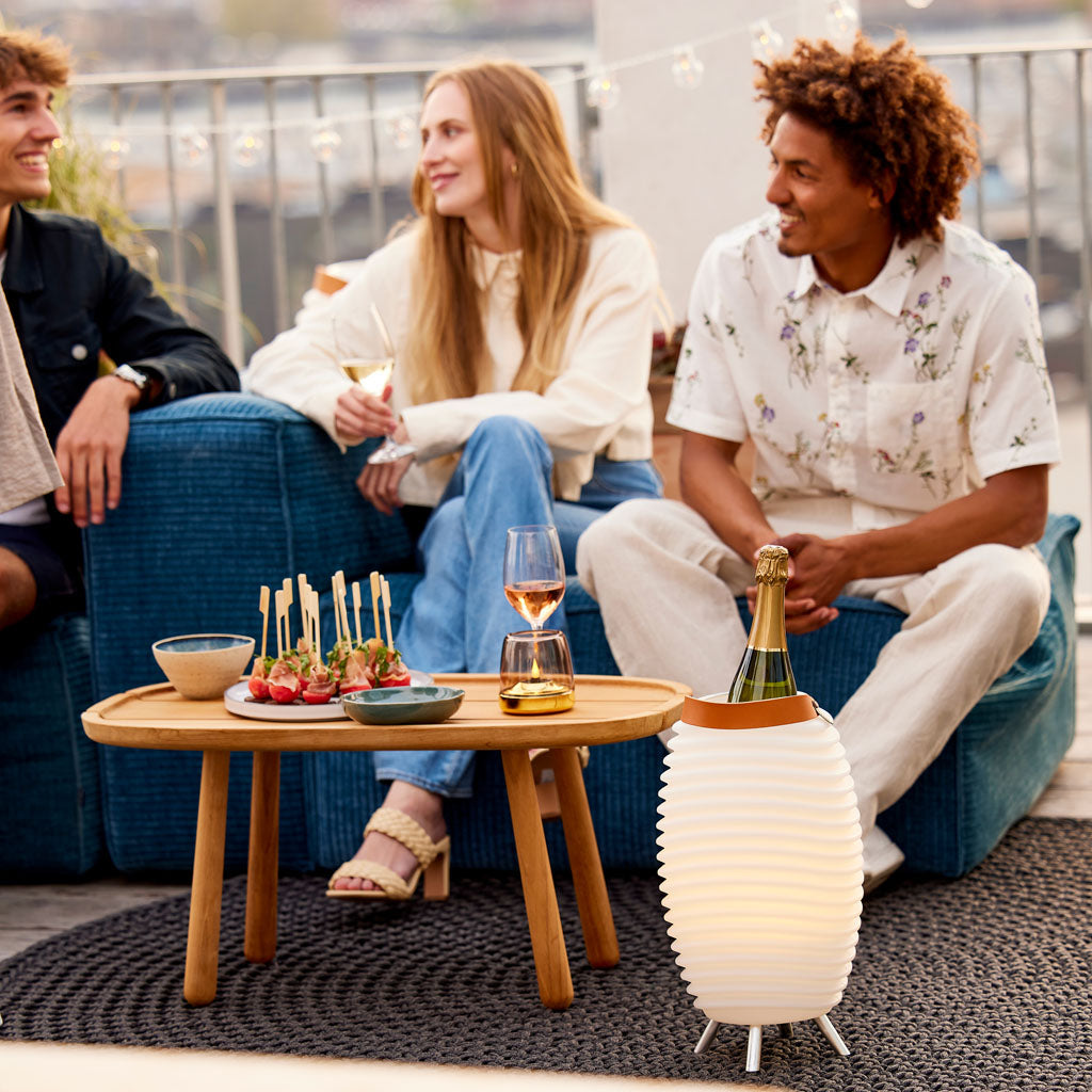 Enjoy the perfect ambiance with the Kooduu Synergy - a LED lamp, Bluetooth speaker, and drinks cooler all in one.