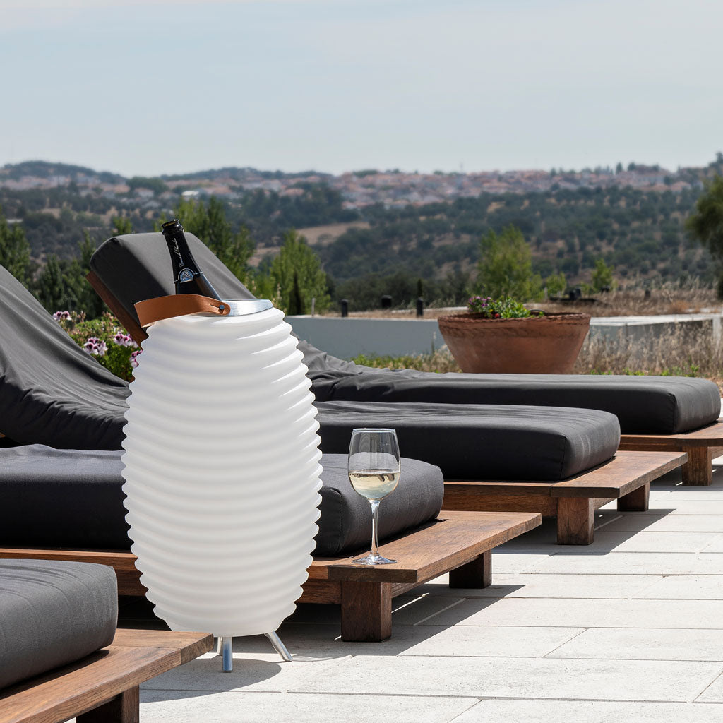 Elevate your next outdoor gathering with the Kooduu Synergy - the perfect 3-in-1 LED lamp, Bluetooth speaker, and drinks cooler to set the mood for any occasion.
