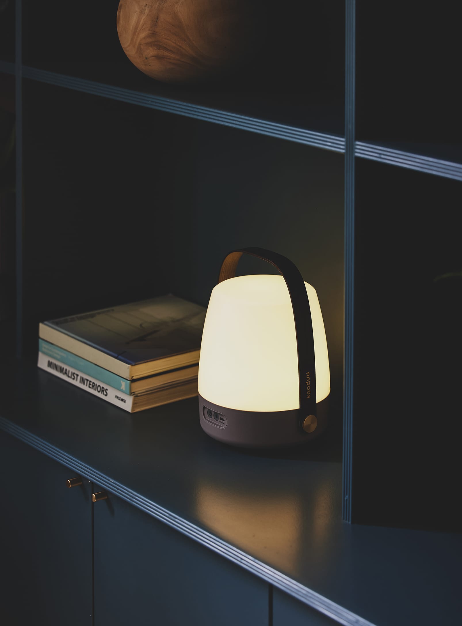 Portable and rechargeable, the Lite-up Earth LED table lamp offers warm, adjustable lighting for cozy indoor or outdoor settings.