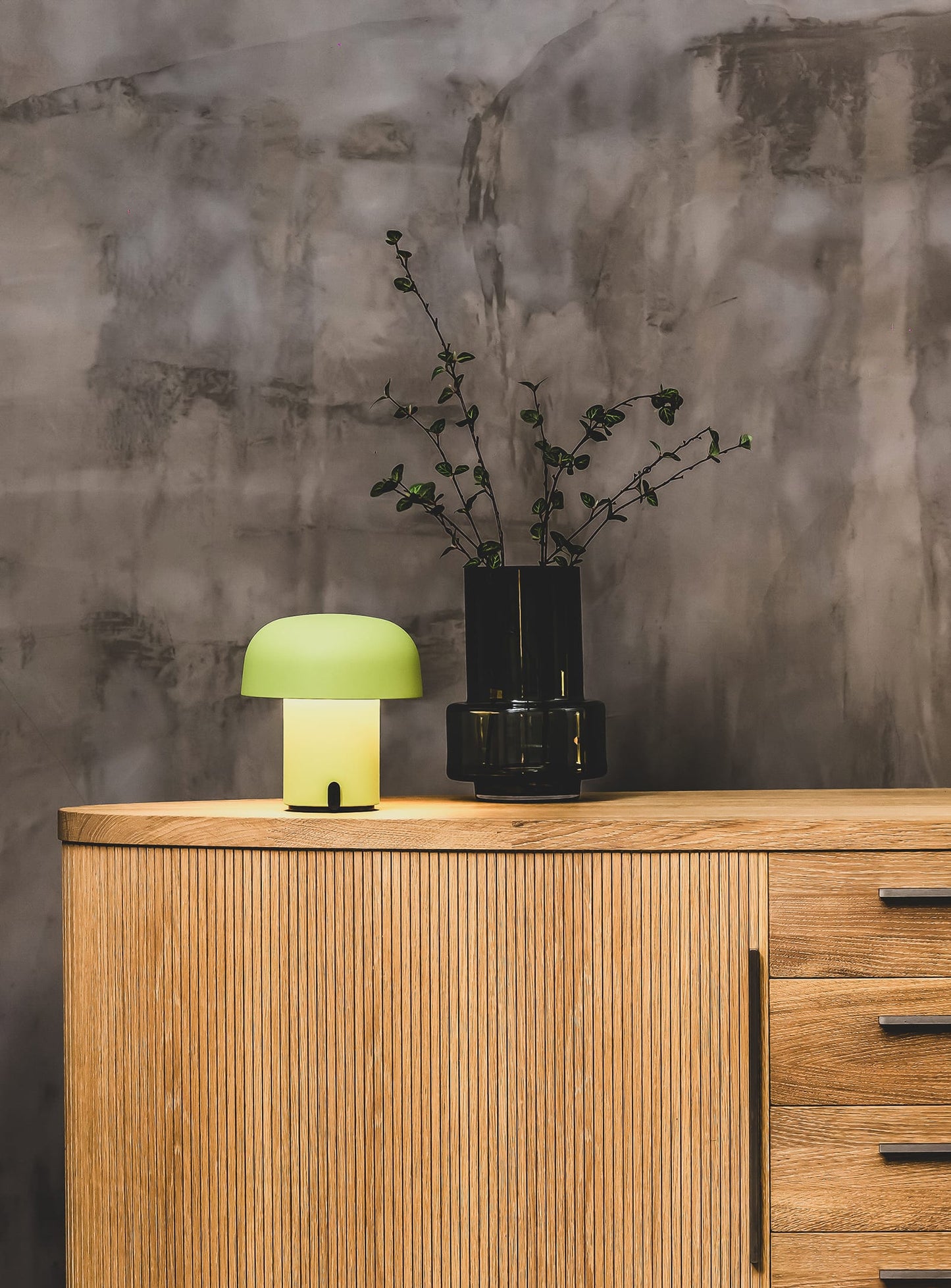 Sensa Moss by Kooduu – rechargeable LED lamp with adjustable brightness and USB charging dock for convenience."