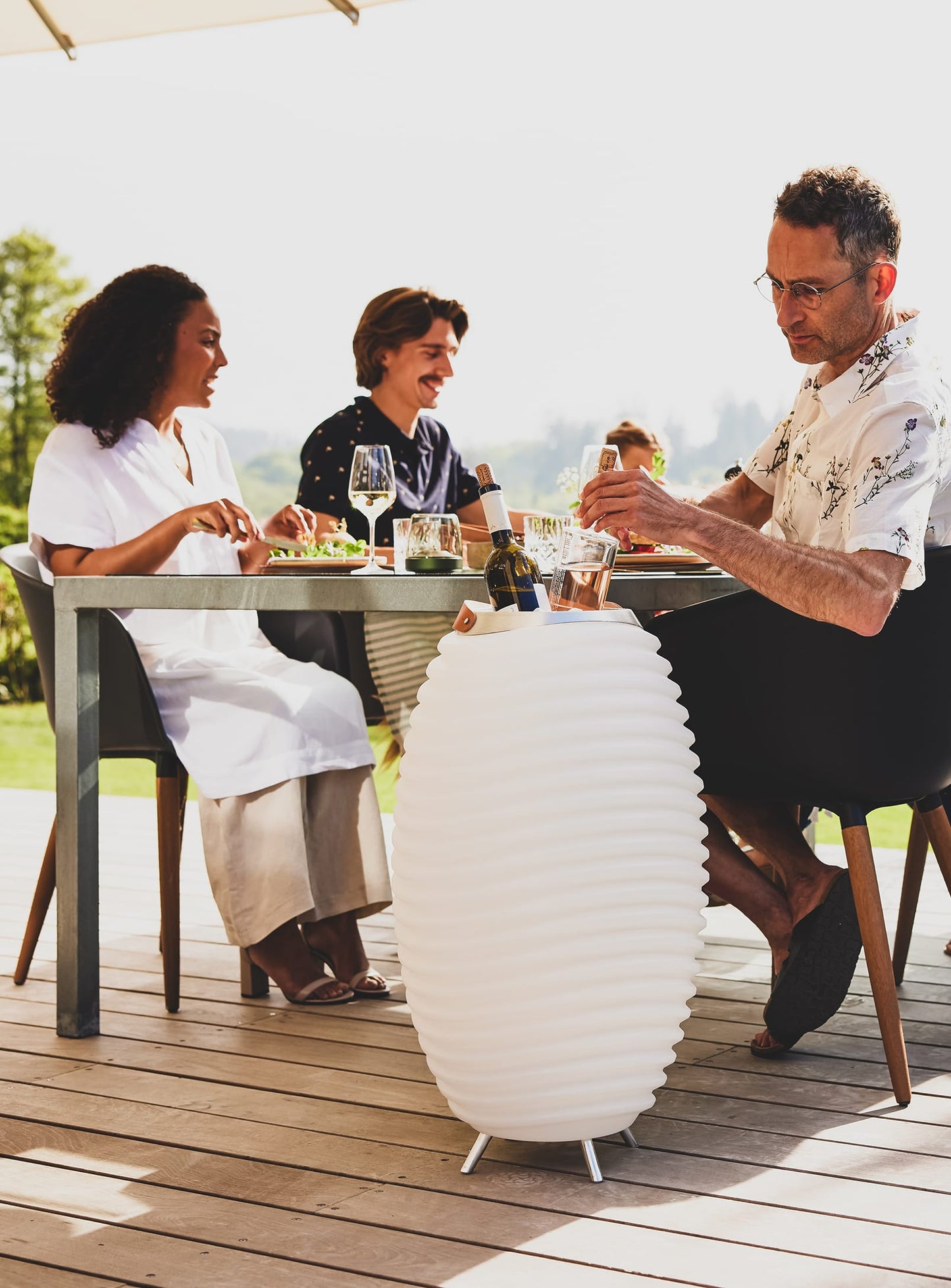 Kooduu Synergy 65 – stylish and functional LED lamp, drink cooler, and Bluetooth speaker for perfect party ambiance.