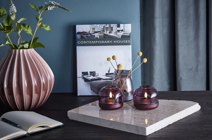Upgrade your candle game with Kooduu Glow candlelight holders - the perfect blend of simplicity and elegance. Available in several colors, these minimalist candle holders offer a safe and durable alternative to traditional candles, while creating a captivating ambiance in any space.