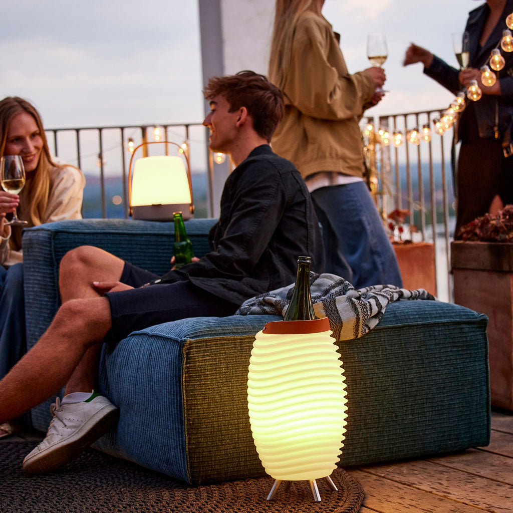 Take your outdoor gatherings to the next level with the Kooduu Synergy, featuring 4 different light intensities, high-quality sound, and a built-in drinks compartment.